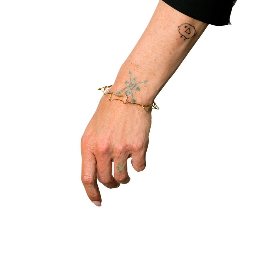FunnyBone - Hunde kødbens led - sælges enkeltvis - 18 Karat Forgyldning. Dropps By Szhirley. papirklips smykke Designet af Szhirley. Multifunktionelt Smykke med mange funktioner. Ankelkæde. halskæde. armbånd